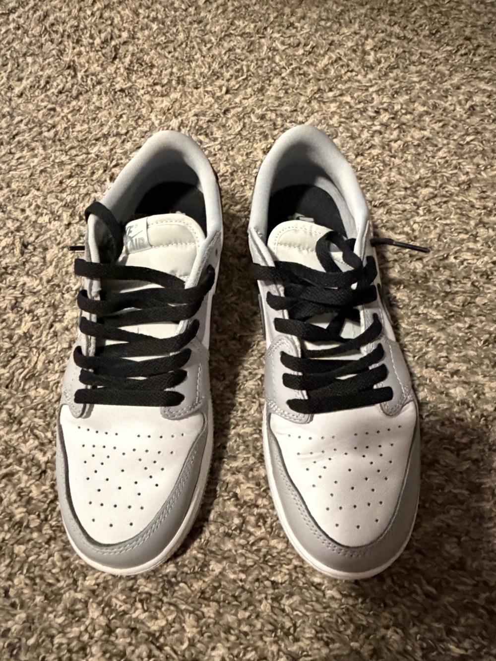 Jordan 1 White and Black Low-Top Sneakers